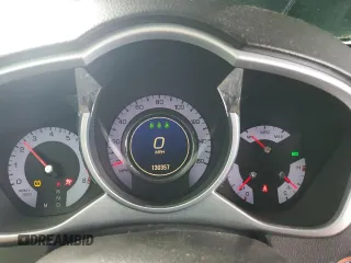 2012 Cadillac SRX Performance Collection with VIN 3GYFNBE33CS540914, listed as a Copart auction lot 54787125 with 130,357 mi miles and Salvage title. Bid and sale history available at DreamBid. Image 9.