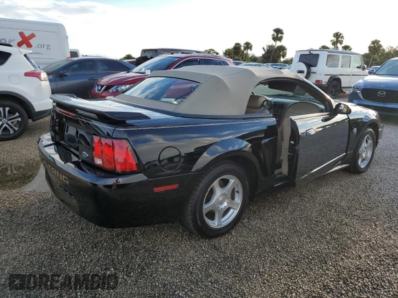 2004 Ford Mustang Deluxe with VIN 1FAFP44414F125267, listed as a Copart auction lot 74595714 with 0 mi miles and Salvage Title. Bid and sale history available at carsss.com. Image 3.