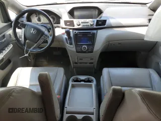 2014 Honda Odyssey Touring with VIN 5FNRL5H95EB044504, listed as a Copart auction lot 59228035 with 259,035 mi miles and Clean title. Bid and sale history available at DreamBid. Image 8.