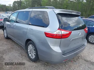2015 Toyota Sienna XLE with VIN 5TDYK3DC7FS659864, listed as a IAAI auction lot 41958112 with 121,257 mi miles and . Bid and sale history available at DreamBid. Image 3.