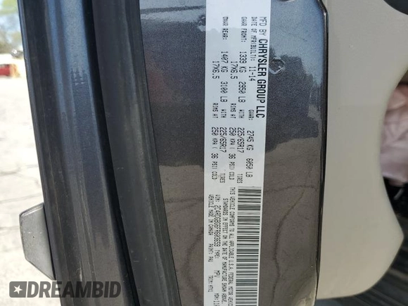 2015 Dodge Grand Caravan American Value with VIN 2C4RDGBG6FR603659, listed as a Copart auction lot 52385735 with 209,818 mi miles and Salvage Title. Bid and sale history available at DreamBid. Image 13.