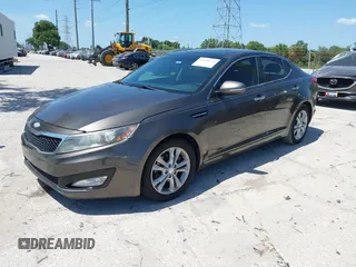 2013 Kia Optima EX with VIN 5XXGN4A78DG220462, listed as a IAAI auction lot 42158221 with 152,637 mi miles and . Bid and sale history available at DreamBid. Image 2.