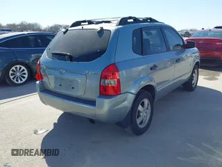 2006 Hyundai Tucson GL with VIN KM8JM12B76U276847, listed as a IAAI auction lot 41767240 with 204,713 mi miles. Bid and sale history available at carsss.com. Image 4.