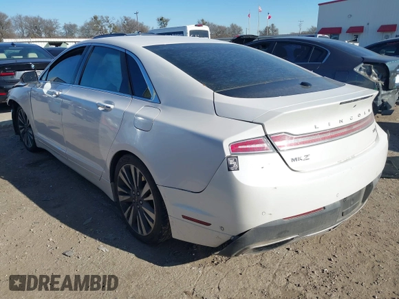 2017 Lincoln MKZ Reserve z VIN 3LN6L5EC6HR632221, wystawiony jako IAAI lot #41369444 z przebiegiem 96 118 mil mil oraz . Historia ofert i sprzedaży dostępna na DreamBid. Obrazek 3.