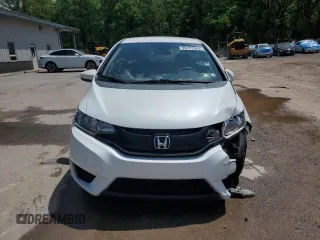 2015 Honda Fit LX z VIN 3HGGK5H59FM760585, wystawiony jako Copart lot #55737365 z przebiegiem 79 700 mil mil oraz Szkoda całkowita • Salvage title. Historia ofert i sprzedaży dostępna na DreamBid. Obrazek 5.