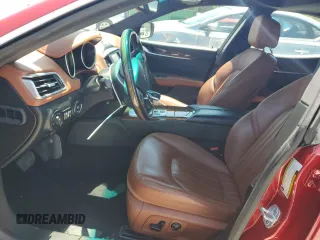 2014 Maserati Ghibli z VIN ZAM57XSA7E1126742, wystawiony jako Copart lot #57495135 z przebiegiem 50 077 mil mil oraz Szkoda całkowita • Salvage title. Historia ofert i sprzedaży dostępna na DreamBid. Obrazek 7.