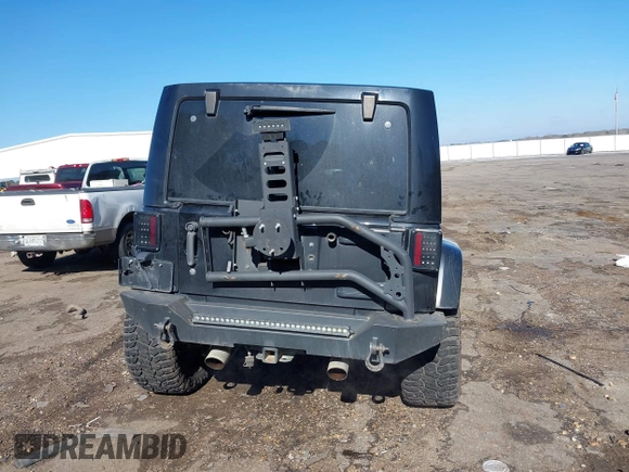 2015 Jeep Wrangler Unlimited Rubicon with VIN 1C4BJWFG9FL755152, listed as a IAAI auction lot 41293766 with 109,153 mi miles. Bid and sale history available at carsss.com. Image 17.