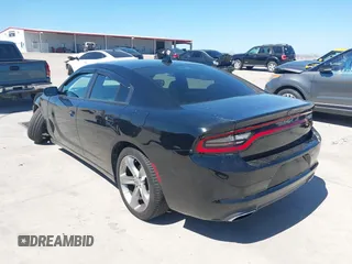 2018 Dodge Charger R/T with VIN 2C3CDXCT9JH128853, listed as a IAAI auction lot 41771706 with 54,962 mi miles and . Bid and sale history available at carsss.com. Image 3.