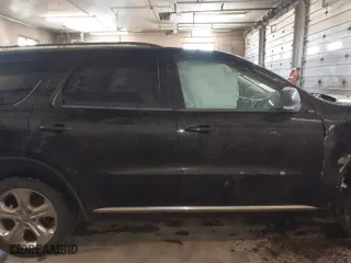 2014 Dodge Durango Limited with VIN 1C4RDJDG1EC973130, listed as a IAAI auction lot 41846596 with 166,182 mi miles. Bid and sale history available at carsss.com. Image 13.