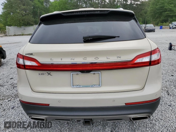 2016 Lincoln MKX Select z VIN 2LMTJ6KR6GBL84027, wystawiony jako Copart lot #54084425 z przebiegiem 122 304 mil mil oraz Szkoda całkowita • Salvage title. Historia ofert i sprzedaży dostępna na DreamBid. Obrazek 6.