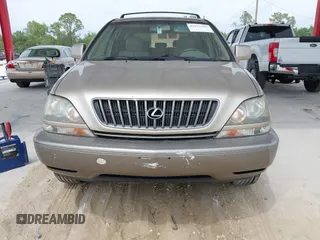 1999 Lexus RX 300 Luxury SUV with VIN JT6HF10U2X0018835, listed as a IAAI auction lot 41875166 with 134,861 mi miles. Bid and sale history available at carsss.com. Image 6.