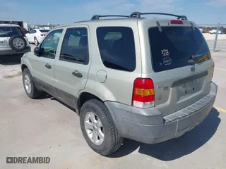 2005 Ford Escape XLT with VIN 1FMCU03165DA08296, listed as a IAAI auction lot 41677892 with 255,431 mi miles. Bid and sale history available at carsss.com. Image 3.