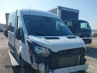 2024 Ford Transit Passenger XL with VIN 1FBAX2C89PKB52360, listed as a IAAI auction lot 41381594 with 43,067 mi miles and . Bid and sale history available at DreamBid. Image 1.