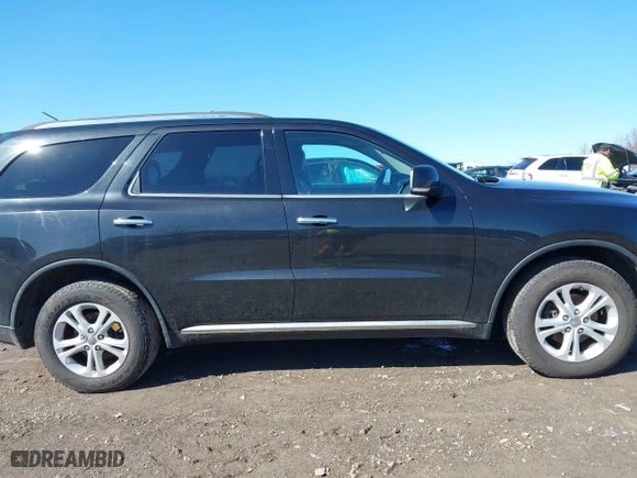 2013 Dodge Durango Crew with VIN 1C4RDJDG6DC540482, listed as a IAAI auction lot 41813209 with 140,875 mi miles. Bid and sale history available at carsss.com. Image 13.