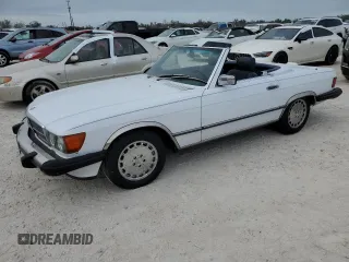 1988 Mercedes-Benz 560 560SL with VIN WDBBA48D3JA086077, listed as a Copart auction lot 77017824 with 169,123 mi miles and Salvage Title. Bid and sale history available at carsss.com. Image 1.
