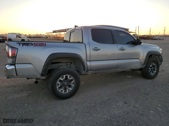 2021 Toyota Tacoma 4WD SR with VIN 3TMCZ5AN9MM415928, listed as a Copart auction lot 49777065 with 96,617 mi miles and Salvage Title. Bid and sale history available at carsss.com. Image 3.