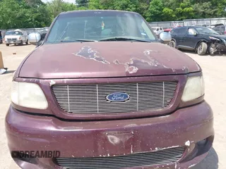 1998 Ford F-150 with VIN 1FTZF1725WNB72765, listed as a IAAI auction lot 42056766 with 210,459 mi miles and . Bid and sale history available at DreamBid. Image 6.