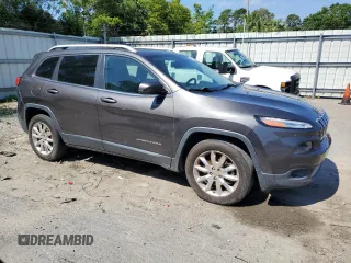 2014 Jeep Cherokee Limited with VIN 1C4PJMDB3EW249699, listed as a Copart auction lot 55488645 with 153,059 mi miles and Clean Title. Bid and sale history available at DreamBid. Image 4.