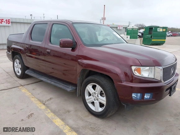 2014 Honda Ridgeline RTL with VIN 5FPYK1F52EB010700, listed as a IAAI auction lot 41490401 with 180,947 mi miles. Bid and sale history available at carsss.com. Image 1.