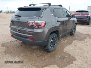 2019 Jeep Compass Trailhawk with VIN 3C4NJDDBXKT795294, listed as a IAAI auction lot 42046344 with 100,395 mi miles and . Bid and sale history available at DreamBid. Image 4.