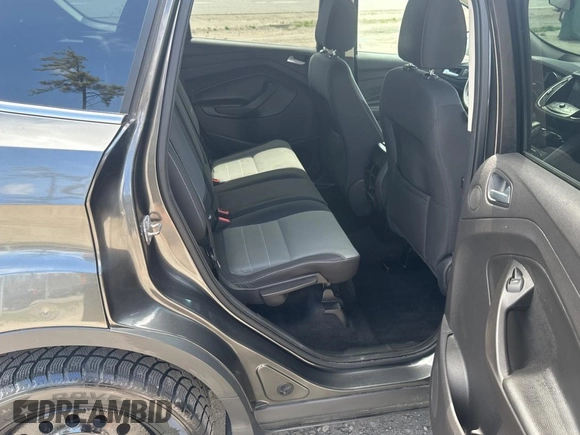 2016 Ford Escape SE with VIN 1FMCU9G91GUB49042, listed as a Copart auction lot 56257705 with 235,024 mi miles and Clean Title. Bid and sale history available at DreamBid. Image 6.