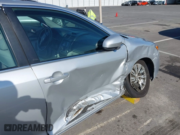 2014 Toyota Camry L with VIN 4T4BF1FK5ER442960, listed as a IAAI auction lot 42206639 with 119,639 mi miles and . Bid and sale history available at DreamBid. Image 6.