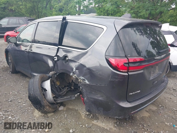 2023 Chrysler Pacifica Hybrid Touring L with VIN 2C4RC1L72PR540902, listed as a IAAI auction lot 42151047 with Not Provided miles and . Bid and sale history available at DreamBid. Image 3.