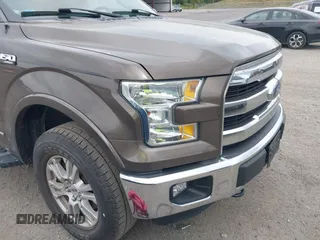 2015 Ford F-150 XLT with VIN 1FTEW1EP1FFC72160, listed as a IAAI auction lot 40351662 with 142,647 mi miles. Bid and sale history available at carsss.com. Image 6.