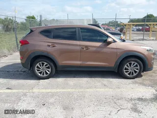 2016 Hyundai Tucson SE with VIN KM8J23A4XGU180300, listed as a IAAI auction lot 42123067 with 123,804 mi miles. Bid and sale history available at carsss.com. Image 13.