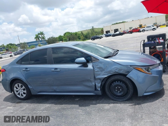2020 Toyota Corolla LE with VIN 5YFEPRAE2LP070450, listed as a IAAI auction lot 40061850 with 62,850 mi miles. Bid and sale history available at carsss.com. Image 6.