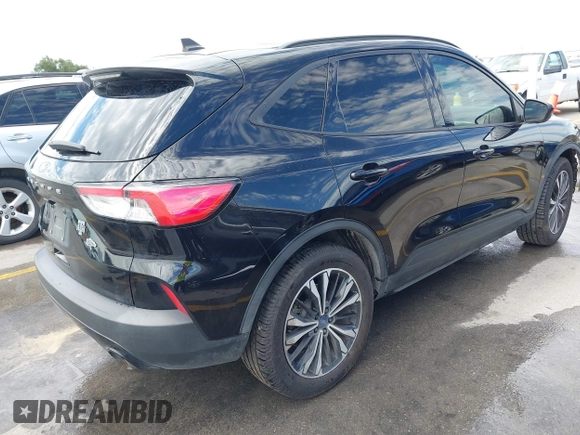 2021 Ford Escape SE with VIN 1FMCU0G62MUA12575, listed as a IAAI auction lot 42293939 with 96,359 mi miles and . Bid and sale history available at DreamBid. Image 4.