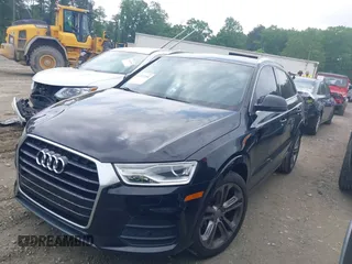 2016 Audi Q3 Premium Plus with VIN WA1BFCFSXGR022587, listed as a IAAI auction lot 42133288 with 141,609 mi miles. Bid and sale history available at carsss.com. Image 14.