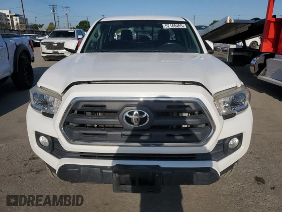 2017 Toyota Tacoma SR z VIN 5TFAX5GN4HX092764, wystawiony jako Copart lot #52150405 z przebiegiem 114 607 mil mil oraz Szkoda całkowita • Salvage title. Historia ofert i sprzedaży dostępna na DreamBid. Obrazek 5.