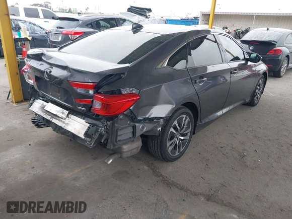2020 Honda Accord with VIN 1HGCV3F10LA015906, listed as a IAAI auction lot 41895296 with 106,341 mi miles and . Bid and sale history available at DreamBid. Image 4.