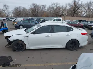 2017 Kia Optima LX with VIN 5XXGT4L32HG171992, listed as a IAAI auction lot 41477494 with 119,415 mi miles. Bid and sale history available at carsss.com. Image 13.