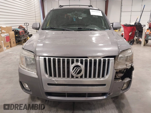 2008 Mercury Mariner Premier z VIN 4M2CU87108KJ15433, wystawiony jako IAAI lot #41924055 z przebiegiem 168 569 mil mil oraz . Historia ofert i sprzedaży dostępna na DreamBid. Obrazek 12.