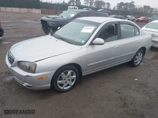 2006 Hyundai Elantra GLS with VIN KMHDN46D66U223371, listed as a IAAI auction lot 41664192 with 217,794 mi miles. Bid and sale history available at carsss.com. Image 2.