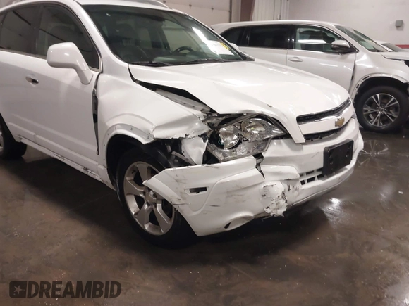 2014 Chevrolet Captiva Sport LT z VIN 3GNAL3EK8ES582752, wystawiony jako IAAI lot #40593238 z przebiegiem 224 027 mil mil oraz . Historia ofert i sprzedaży dostępna na DreamBid. Obrazek 6.