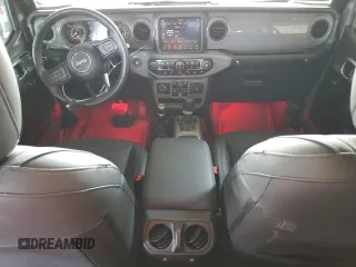 2022 Jeep Wrangler Unlimited High Tide with VIN 1C4HJXDG2NW221829, listed as a Copart auction lot 64836074 with 3,394 mi miles and Salvage Title. Bid and sale history available at DreamBid. Image 8.