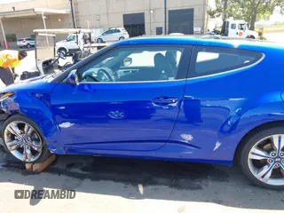 2013 Hyundai Veloster w/Black Int with VIN KMHTC6AD6DU143974, listed as a IAAI auction lot 42164745 with 136,195 mi miles and . Bid and sale history available at DreamBid. Image 14.