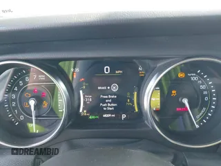 2021 Jeep Wrangler Unlimited Sahara z VIN 1C4JJXP6XMW840844, wystawiony jako IAAI lot #42152271 z przebiegiem 68 209 mil mil oraz . Historia ofert i sprzedaży dostępna na DreamBid. Obrazek 7.
