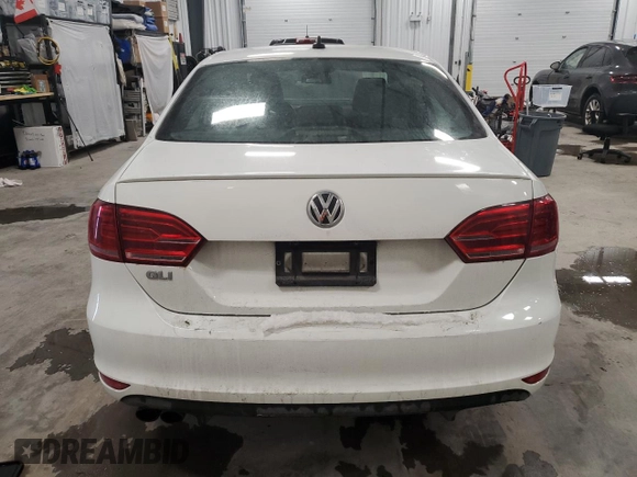 2014 Volkswagen Jetta GLI Edition 30 z VIN 3VW4S7AJ9EM277971, wystawiony jako Copart lot #88305645 z przebiegiem 167 931 mil mil oraz Szkoda całkowita • Salvage title. Historia ofert i sprzedaży dostępna na DreamBid. Obrazek 6.