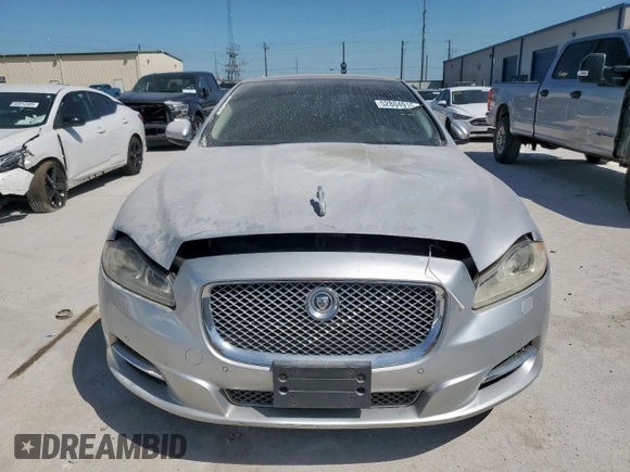2012 Jaguar XJ with VIN SAJWA1CB0CLV23002, listed as a Copart auction lot 52804915 with 149,331 mi miles and Salvage title. Bid and sale history available at DreamBid. Image 5.