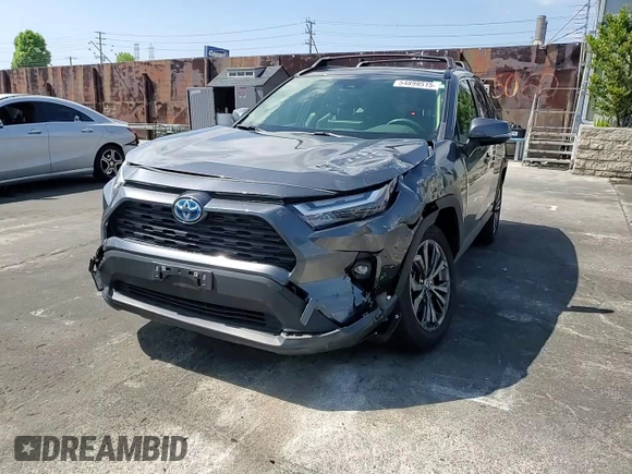 2023 Toyota RAV4 Hybrid XLE Premium z VIN JTMB6RFV5PD080395, wystawiony jako Copart lot #54899515 z przebiegiem 9 190 mil mil oraz Szkoda całkowita • Salvage title. Historia ofert i sprzedaży dostępna na DreamBid. Obrazek 14.