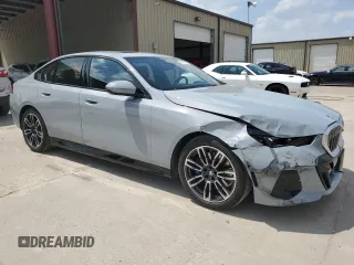 2025 BMW 5 Series 530i with VIN WBA43FJ01SCT75551, listed as a Copart auction lot 53559065 with 7,348 mi miles and Clean Title. Bid and sale history available at carsss.com. Image 4.
