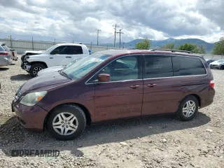 2007 Honda Odyssey EX z VIN 5FNRL38417B091668, wystawiony jako Copart lot #57062105 z przebiegiem 181 933 mil mil oraz Czysty tytuł • Clean title. Historia ofert i sprzedaży dostępna na DreamBid. Obrazek 1.