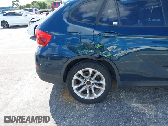 2015 BMW X1 xDrive28i z VIN WBAVL1C57FVY30820, wystawiony jako IAAI lot #40693352 z przebiegiem 111 221 mil mil oraz . Historia ofert i sprzedaży dostępna na DreamBid. Obrazek 16.