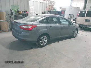 2014 Ford Focus SE with VIN 1FADP3F28EL285971, listed as a IAAI auction lot 41290979 with 149,900 mi miles. Bid and sale history available at carsss.com. Image 4.