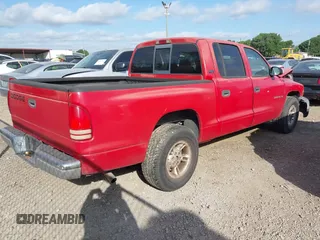 2000 Dodge Dakota Sport with VIN 1B7GL2AN0YS705134, listed as a IAAI auction lot 41997957 with 219,659 mi miles. Bid and sale history available at carsss.com. Image 4.