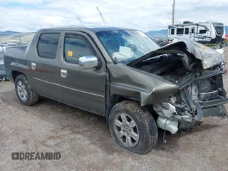 2007 Honda Ridgeline RTL z VIN 2HJYK165X7H548904, wystawiony jako IAAI lot #42353006 z przebiegiem 131 560 mil mil oraz . Historia ofert i sprzedaży dostępna na DreamBid. Obrazek 1.